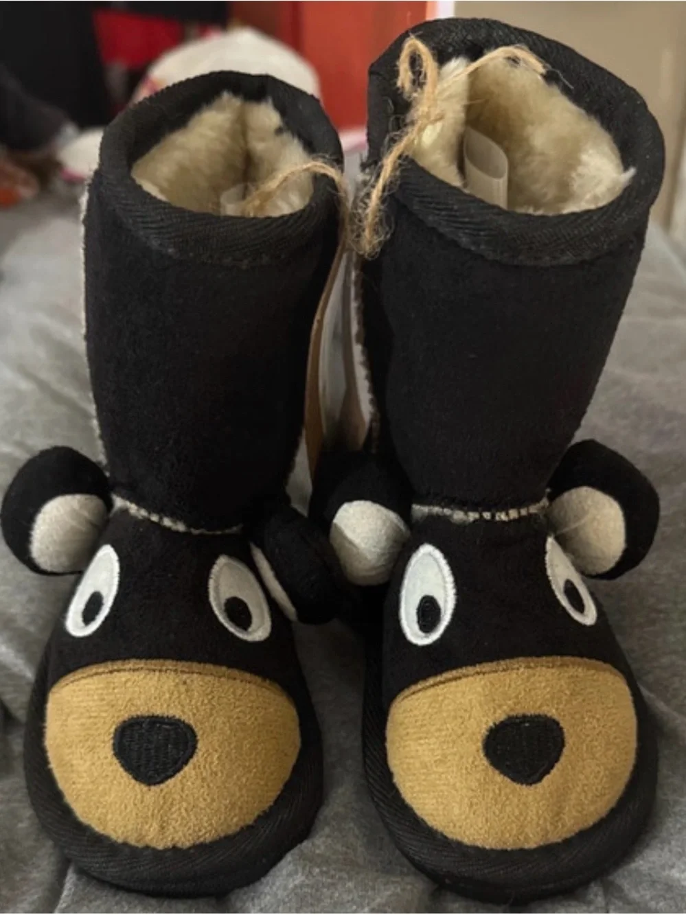 Lazy One Black Plush Boot Slippers with Tan Stitching